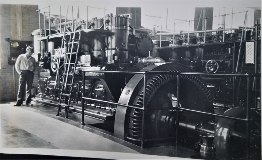 Diesel 2: A worker appears to be listening to the hum of Unit #One. A 450hp Fairbanks Morse Diesel Engine. Note the spittoon in the lower right. 